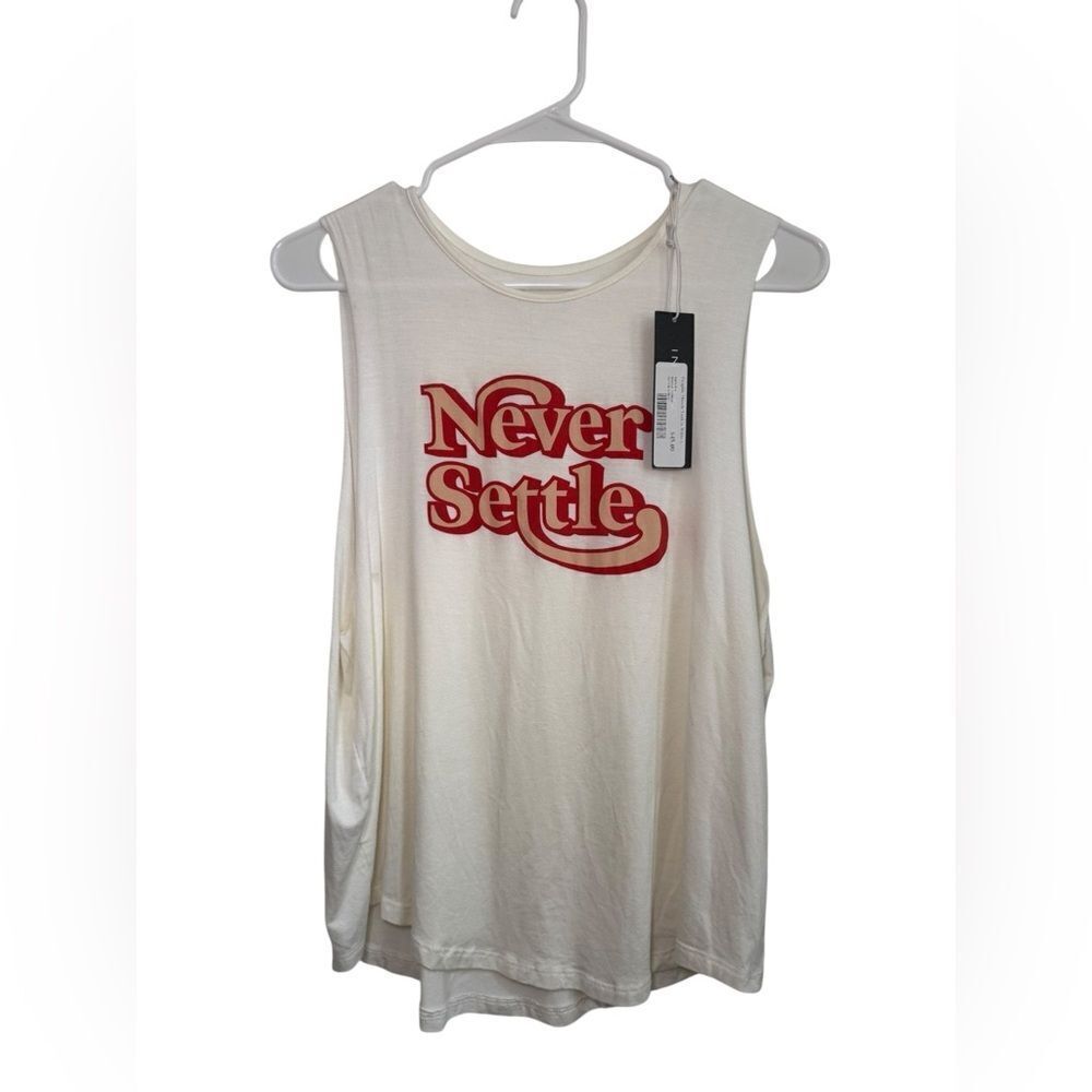 Women's Interval “Never Settle” Top